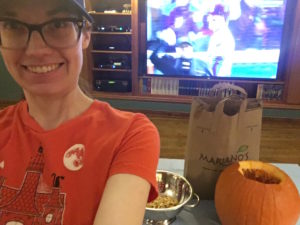 Carving pumpkins during the Cubs game
