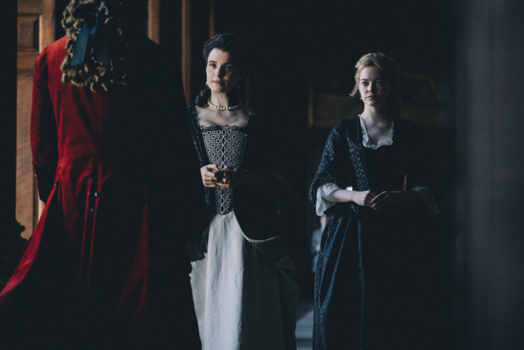 Rachel Weisz and Emma Stone in the film THE FAVOURITE

